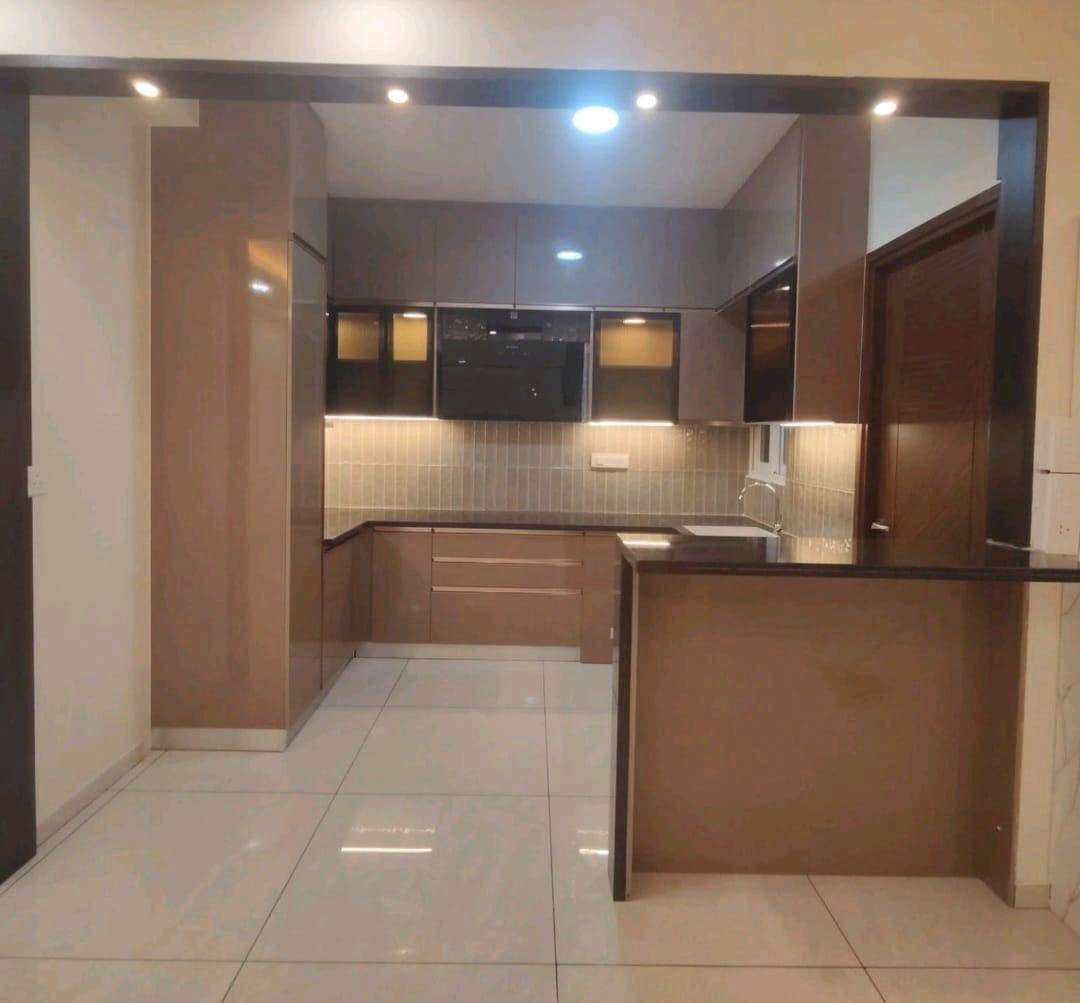 Walnut Finish Kitchen & Dining — Residential project by AV Engineering & Interiors